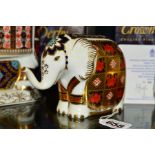 A ROYAL CROWN DERBY PAPERWEIGHT, 'Small Elephant' with gold stopper