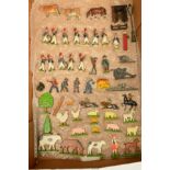 A QUANTITY OF HOLLOWCAST FIGURES, to include unmarked Napoleon figure and soldiers, Britains Cows,