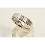 A MODERN 18CT WHITE GOLD FLAT SECTION WEDDING BAND measuring approximately 6.0mm in width, engine