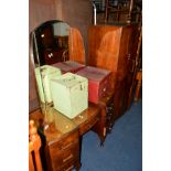 AN ART DECO WALNUT TWO PIECE BEDROOM SUITE, comprising a gentlemans two door wardrobe and a dressing