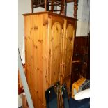 A PINE TWO DOOR WARDROBE, width 93cm x depth 57cm x height 190cm (key) a double headboard, two