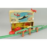 AN UNBOXED CHAD VALLEY TINPLATE CLOCKWORK OVERHEAD RAILWAY, red, white and blue lithographed