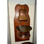 A 20TH CENTURY OAK ORNATE WALL MOUNTED WATER FEATURE, with a copper reservoir and brass taps above a