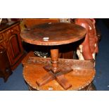 A REPRODUCTION OAK CIRCULAR TOPPED OCCASIONAL TABLE