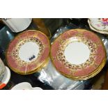 SEVEN ROYAL CROWN DERBY PLATES, A1359 'Heritage' pattern, pink and lilac bands with gilt