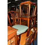 AN EDWARDIAN MAHOGANY FOLIATE DECORATED CHAIR, four other Edwardian chairs, a mahogany armchair,