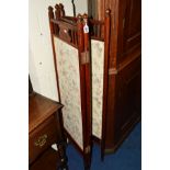 AN EDWARDIAN MAHOGANY TRIPLE FOLD FLOORSTANDING SCREEN with upholstered panels