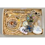 A SMALL SELECTION OF COSTUME JEWELLERY, to include a hinged silver bangle, with silver hallmark, a