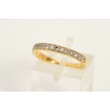 AN 18CT GOLD DIAMOND HALF ETERNITY RING, set with fifteen brilliant cut diamonds, estimated total