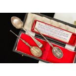 THREE SILVER SPOONS, to include two silver replicas of the coronation anointing spoon, hallmarks for