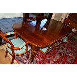 A VICTORIAN MAHOGANY EXTENDING DINING TABLE OF RECTANGULAR FORM, rounded ends, lacks wind out