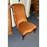 A MID VICTORIAN WALNUT FRAMED NURSING CHAIR, rectangular back with scrolled top above a serpentine