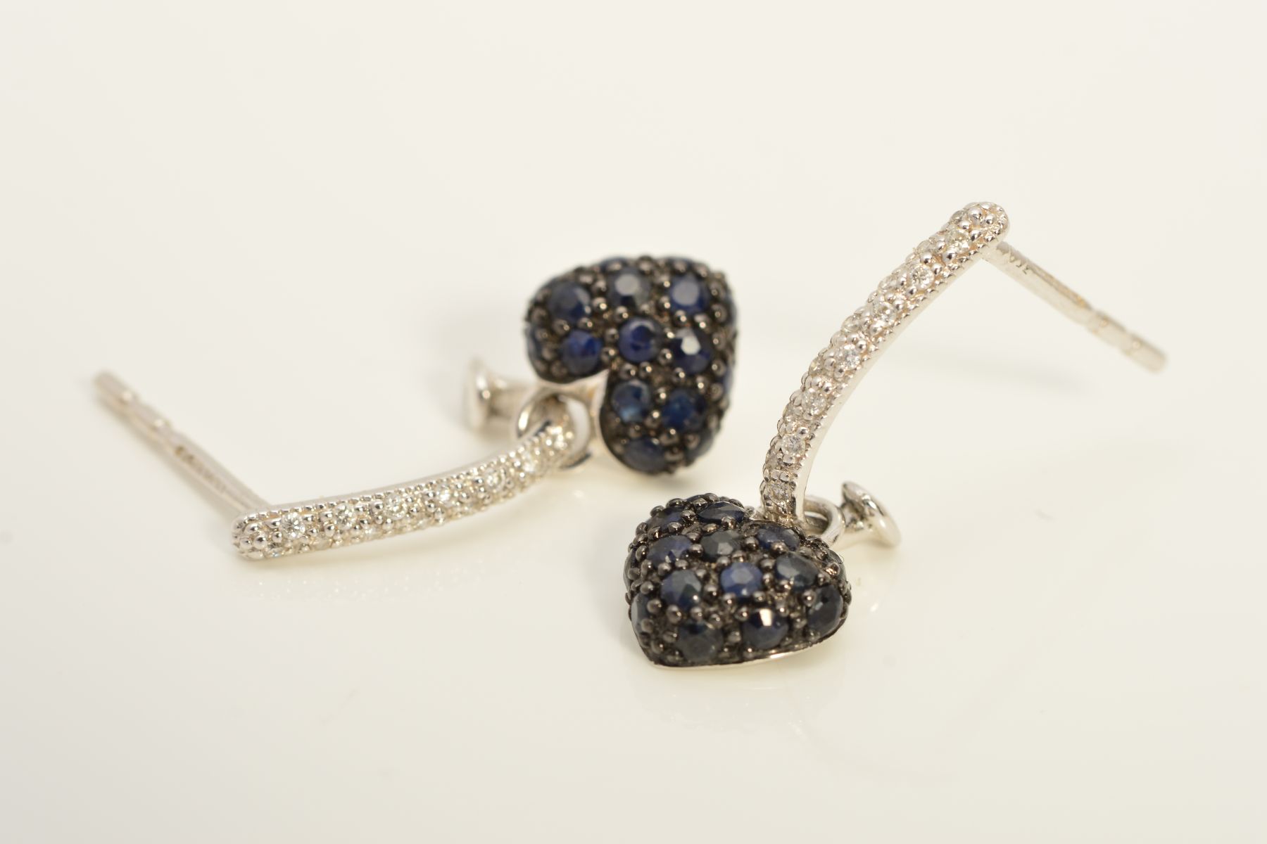 A PAIR OF 18CT WHITE GOLD DIAMOND AND SAPPHIRE DROP EARRINGS, each designed as a heart shape