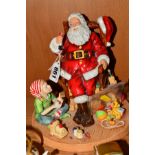 A ROYAL DOULTON FIGURE GROUP, 'Father Christmas 2011' HN5436 (toy soldiers head loose)
