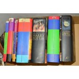 ROWLING J.K, a set of seven Harry Potter books, first two in paperback the rest hardback with dust