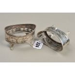 A PAIR OF LATE VICTORIAN SILVER NEO-CLASSICAL REVIVAL OVAL SALTS, lacking glass liners, makers
