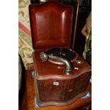 AN EARLY 20TH CENTURY METAL WIND UP GRAMOPHONE with a double front door revealing a metal horn