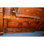 A REPRODUCTION OAK TRIPLE PANEL MULE CHEST with two drawers, width 122cm x depth 47cm x height 72cm