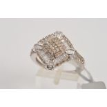 A 9CT WHITE GOLD DIAMOND DRESS RING, designed as a central diamond shape of single cut diamonds