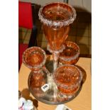 A LATE VICTORIAN ORANGE AND CLEAR GLASS EPERGNE, central invested baluster vase surrounded by