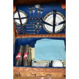 A WICKER BREXTON COLLECTION PICNIC HAMPER, fitted for four settings, including Wedgwood Runnymede