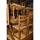 AN OLD CHARM OAK DRAW LEAF TABLE, six chairs including two carvers, an old charm oak linenfold