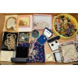 A BOX OF COSTUME JEWELLERY, to include some gem set silver and white metal pendants, earrings and