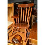 A MODERN HARDWOOD ROCKING CHAIR