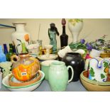 A COLLECTION OF PLANTERS, JUGS, COLOURED GLASS BOTTLES ETC, including a West German globular ewer,