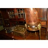 A COPPER AND BRASS STAND in the form of a coal scuttle, brass slipper box and a fire place front (