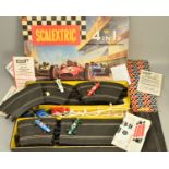 A BOXED SCALEXTRIC 4 IN 1 MODEL MOTOR RACING SET, No.80, complete with all four cars, 2 x Cooper F1,