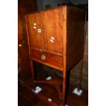 A GEORGIAN MAHOGANY TWO DOOR POT CUPBOARD with a single drawer on a cross framed stretcher, width