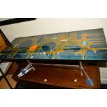 A 1970'S RECTANGULAR TILE TOP AND CHROME COFFEE TABLE, the twenty four tiles decorated with abstract