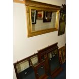 A MODERN GILT FRAMED BEVELLED EDGE OVERMANTEL MIRROR, together with four various Edwardian