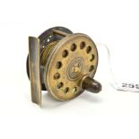 AN EARLY 20TH CENTURY BRASS FISHING REEL, marked for C.Farlow & Co of 191 Strand, London, diameter