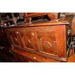 A CARVED OAK PANELLED BLANKET CHEST, width 120cm x depth 45cm x height 51cm