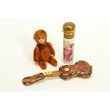 THREE ITEMS, to include a Schuco monkey (feet missing, well worn), an early 20th Century miniature