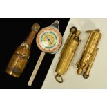 FOUR MISCELLANEOUS ITEMS, to include two WWI lighters, a base metal champagne bottle shaped sifter