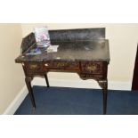 A LATE VICTORIAN EDWARDS & ROBERTS MARBLE TOPPED WALNUT WASHSTAND, the rectangular top with raised