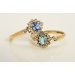 TWO 9CT GOLD GEM SET CLUSTER RINGS, the first set with a central oval blue topaz within a single cut