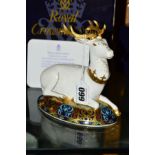 A BOXED ROYAL CROWN DERBY LIMITED EDITION PAPERWEIGHT, 'The White Hart Heraldic Stag Paperweight',