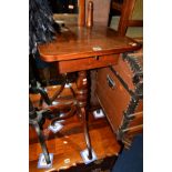 AN EARLY 20TH CENTURY OAK SEWING TABLE on a tripod base, height 75cm