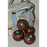 FOUR GREENMASTER PRO-LINE SIZE 2 CROWN GREEN BOWLING BALLS, in a Henselite carry case