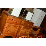 A PAIR OF MODERN PINE BEDSIDE CABINETS with single drawers and a metal two drawer filing cabinet (