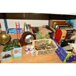 FOUR BOXES AND LOOSE SUNDRY ITEMS to include cast iron scales, modern travel guides, Charles Dickens