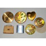 SEVEN MID 20TH CENTURY COMPACTS, to include a hangbag shaped compact by Mascot, a heart shape