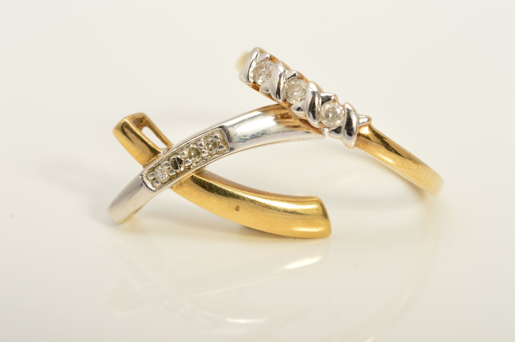 A 9CT GOLD BI-COLOUR DIAMOND RING AND PENDANT, the ring designed as three brilliant cut diamonds