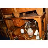 A 20TH CENTURY OAK DOUBLE SEATED SCHOOL DESK, with two central drawers, width 168cm x depth 61cm x