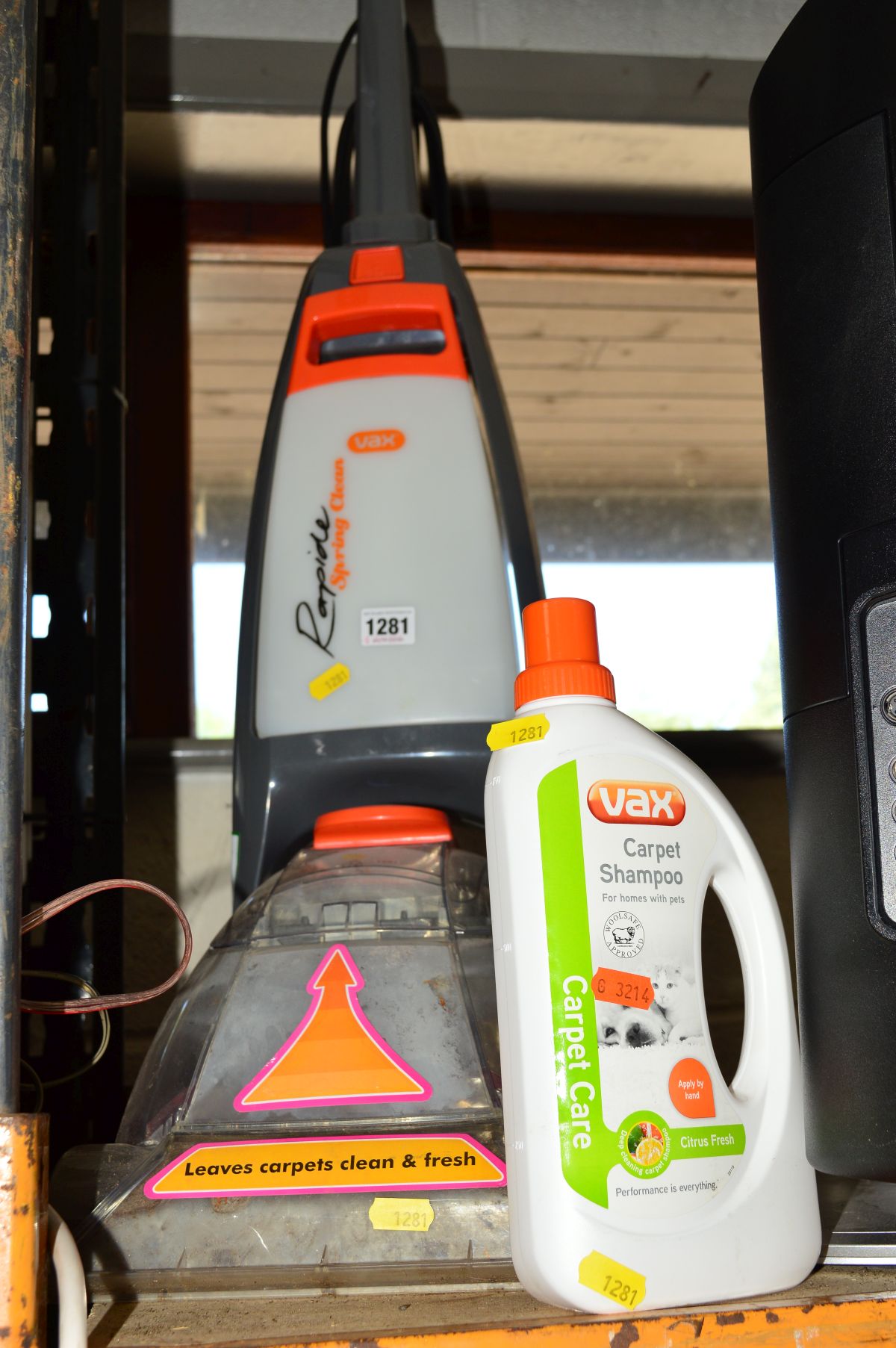 A VAX CARPET CLEANER together with a bottle of Vax carpet shampoo (2)