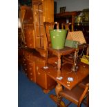 AN OAK ART DECO DRAW LEAF TABLE, four chairs, matching sideboard with five drawers and a bureau/